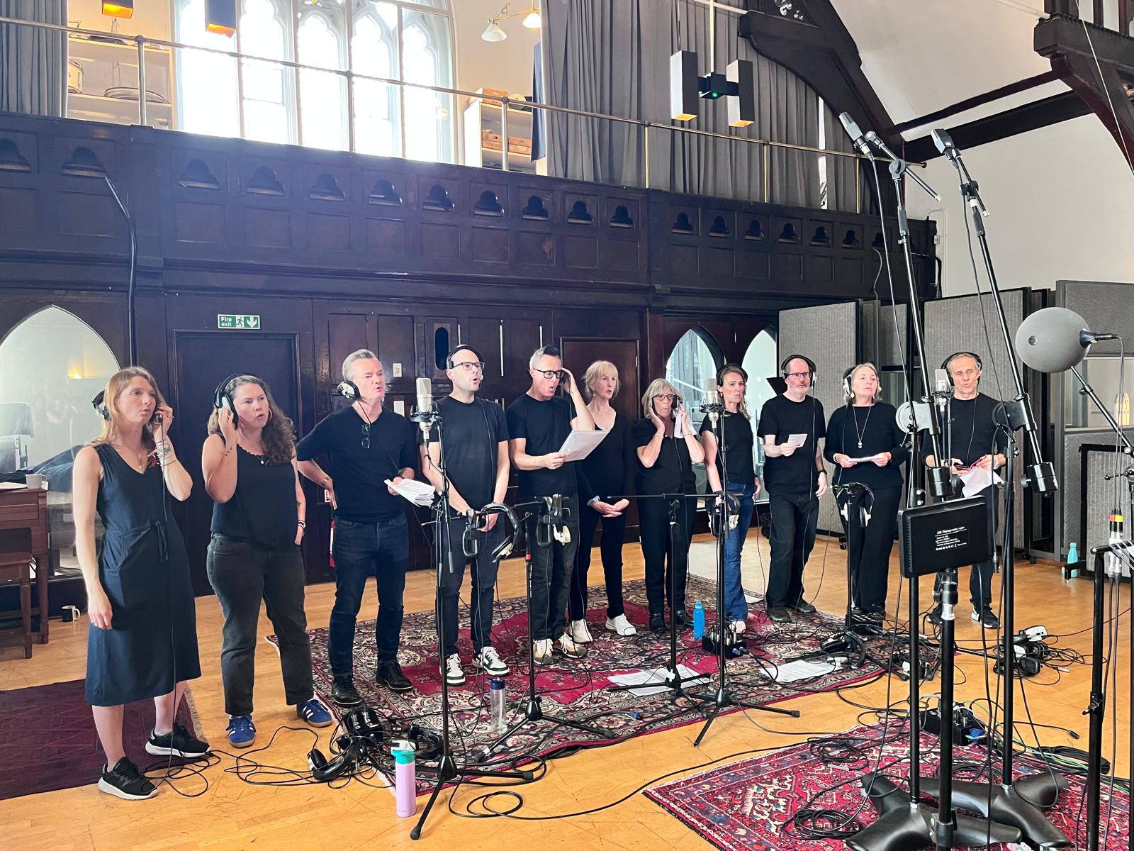 SLYMI members recording together inside The Church Studio