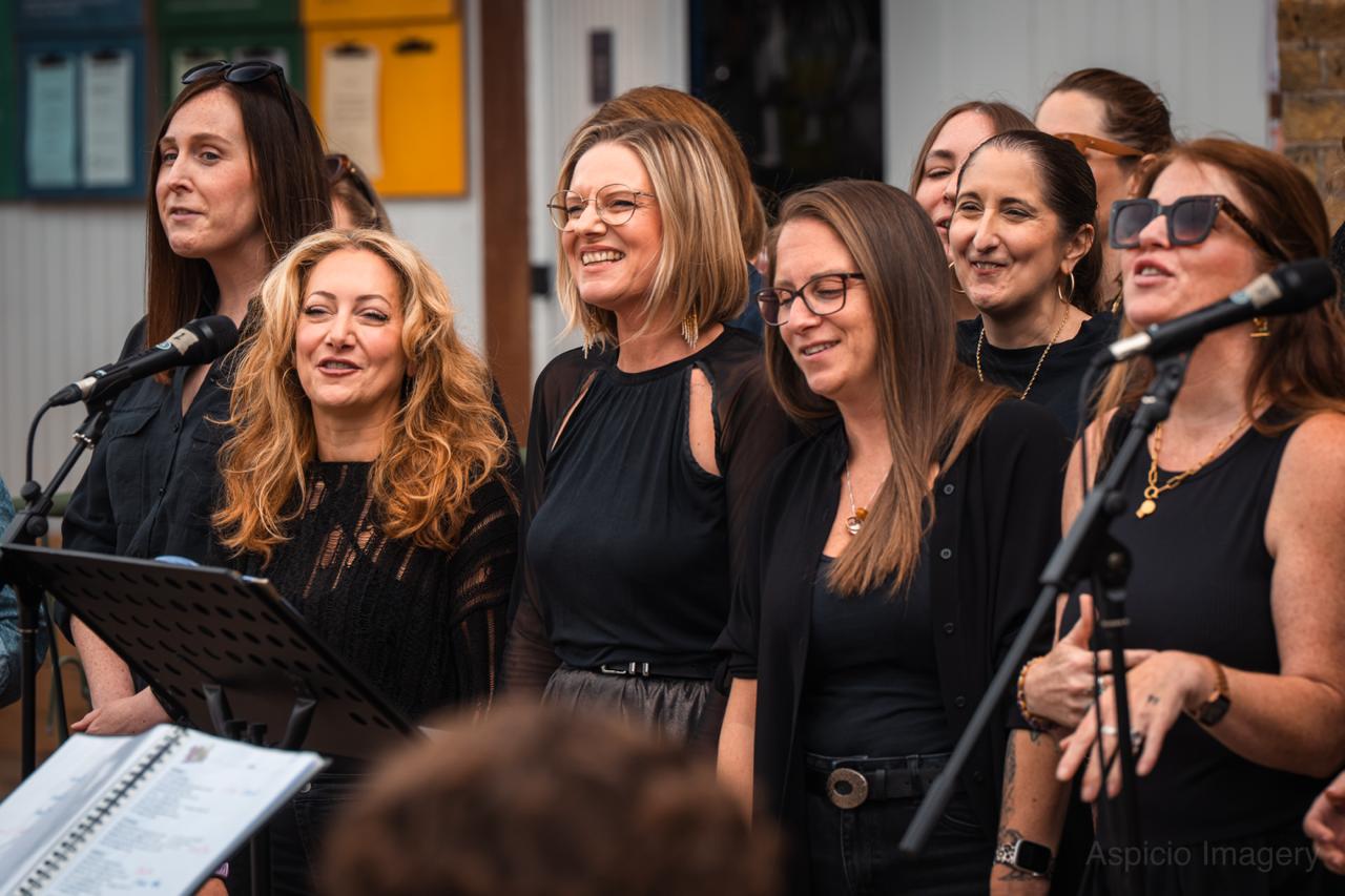 SLYMI choir performing together